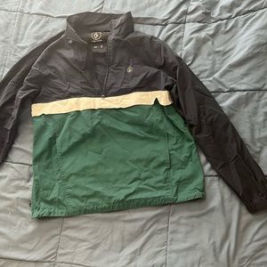 Blue and white volcom pullover windbreaker